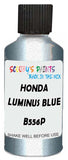 Detail brush applying White Metallic to a small door scratch on an Honda Freed, clean OEM finish