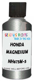 Detail brush applying Silver Metallic to a small door scratch on an Honda Element, clean OEM finish