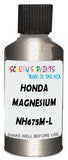 Detail brush applying Grey Metallic to a small door scratch on an Honda Element, clean OEM finish