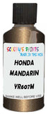 Detail brush applying Gold Metallic to a small door scratch on an Honda Jade, clean OEM finish