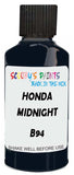 Detail brush applying Black Solid to a small door scratch on an Honda Cr-V, clean OEM finish