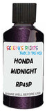 Detail brush applying Purple Metallic to a small door scratch on an Honda Fit, clean OEM finish