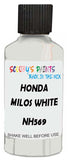 Detail brush applying White Solid to a small door scratch on an Honda Civic, clean OEM finish