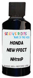 Detail brush applying Black Metallic to a small door scratch on an Honda E, clean OEM finish