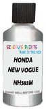 Detail brush applying Silver Metallic to a small door scratch on an Honda Civic, clean OEM finish