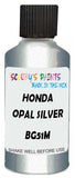 Detail brush applying Silver Metallic to a small door scratch on an Honda Civic, clean OEM finish