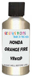 Detail brush applying Beige Metallic to a small door scratch on an Honda Civic, clean OEM finish