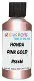 Detail brush applying Pink Metallic to a small door scratch on an Honda Fit, clean OEM finish