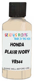Detail brush applying White Solid to a small door scratch on an Honda Accord, clean OEM finish