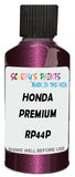 Detail brush applying Pink Metallic to a small door scratch on an Honda Zest, clean OEM finish