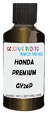 Detail brush applying Brown Metallic to a small door scratch on an Honda Zest Spark, clean OEM finish