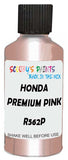 Detail brush applying Pink Metallic to a small door scratch on an Honda Fit, clean OEM finish