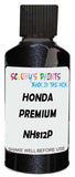 Detail brush applying Black Metallic to a small door scratch on an Honda Freed Hybrid, clean OEM finish