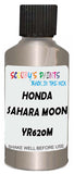 Detail brush applying Silver Metallic to a small door scratch on an Honda Cr-V, clean OEM finish