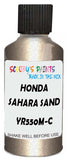 Detail brush applying Beige Metallic to a small door scratch on an Honda Cr-V, clean OEM finish