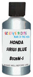 Detail brush applying Blue Metallic to a small door scratch on an Honda Fit, clean OEM finish