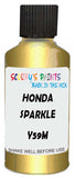 Detail brush applying Gold Metallic to a small door scratch on an Honda Cr-V, clean OEM finish