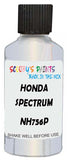 Detail brush applying White Metallic to a small door scratch on an Honda Insight, clean OEM finish