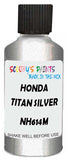 Detail brush applying Silver Metallic to a small door scratch on an Honda Civic, clean OEM finish