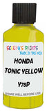 Detail brush applying Yellow Metallic to a small door scratch on an Honda Civic, clean OEM finish