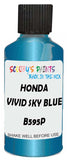 Detail brush applying Blue Metallic to a small door scratch on an Honda Fit, clean OEM finish