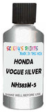 Detail brush applying Silver Metallic to a small door scratch on an Honda Civic, clean OEM finish