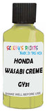 Detail brush applying Green Solid to a small door scratch on an Honda Freed, clean OEM finish