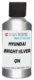Detail brush applying Silver Metallic to a small door scratch on an Hyundai Grand Starex, clean OEM finish