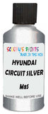 Detail brush applying Silver Metallic to a small door scratch on an Hyundai Santa Fe Xl, clean OEM finish