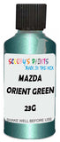 Detail brush applying Green Metallic to a small door scratch on an Mazda 323, clean OEM finish