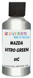 Detail brush applying Green Metallic to a small door scratch on an Mazda 2, clean OEM finish