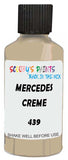 Detail brush applying Beige Solid to a small door scratch on an Mercedes 300 Sl, clean OEM finish