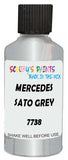 Detail brush applying Grey Metallic to a small door scratch on an Mercedes 190, clean OEM finish