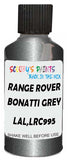 Detail brush applying Grey Metallic to a small door scratch on an Land Rover Freelander, clean OEM finish