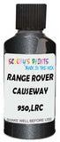 Detail brush applying Grey Metallic to a small door scratch on an Land Rover , clean OEM finish