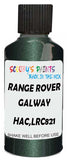 Detail brush applying Green Metallic to a small door scratch on an Land Rover Lr2, clean OEM finish