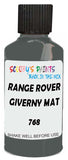Detail brush applying Grey Solid to a small door scratch on an Land Rover , clean OEM finish