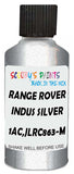 Detail brush applying Silver Metallic to a small door scratch on an Land Rover Lr4, clean OEM finish