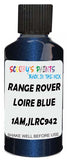 Detail brush applying Blue Metallic to a small door scratch on an Land Rover Discovery, clean OEM finish