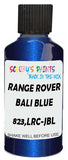 Detail brush applying Blue Metallic to a small door scratch on an Land Rover Discovery, clean OEM finish