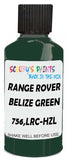 Detail brush applying Green Solid to a small door scratch on an Land Rover , clean OEM finish