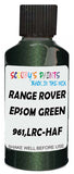 Detail brush applying Green Metallic to a small door scratch on an Land Rover Freelander, clean OEM finish
