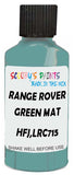 Detail brush applying Green Solid to a small door scratch on an Land Rover , clean OEM finish
