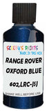 Detail brush applying Blue Metallic to a small door scratch on an Land Rover Discovery, clean OEM finish