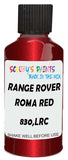 Detail brush applying Red Metallic to a small door scratch on an Land Rover , clean OEM finish