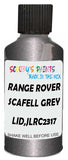Detail brush applying Grey Metallic to a small door scratch on an Land Rover Discovery, clean OEM finish