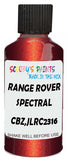 Detail brush applying Red Metallic to a small door scratch on an Land Rover Discovery, clean OEM finish