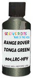 Detail brush applying Green Metallic to a small door scratch on an Land Rover Defender, clean OEM finish