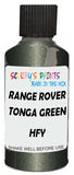 Detail brush applying Green Metallic to a small door scratch on an Land Rover Defender, clean OEM finish